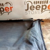 Occasion : Duster avec baguette coffre couvre plateau noir Bestop (déchirure) pour Jeep Wrangler YJ